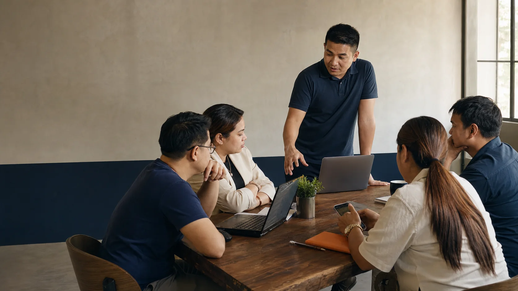Filipino business owners learning together in a small GroundUp workshop